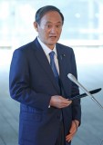 Japan on ‘maximum alert’ after record virus cases: PM