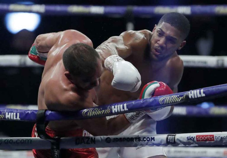 Fury awaits as Joshua KOs Pulev to retain heavyweight belts