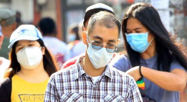WHO fine-tunes advice on COVID masks for public, health workers
