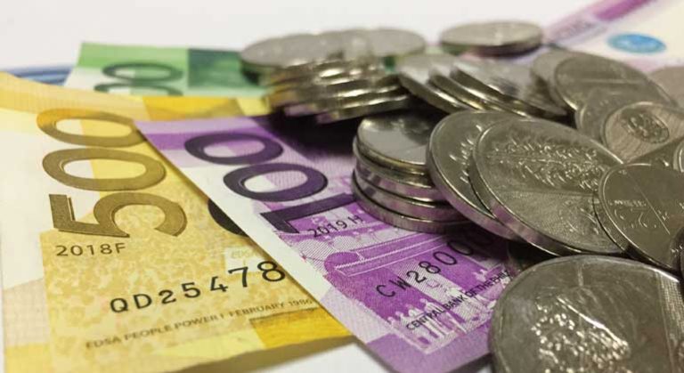 Peso inches higher as holiday season starts
