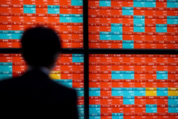 Asian markets struggle as traders lick wounds after tough week