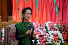 Junta says Suu Kyi broke secrets law, international pressure rises