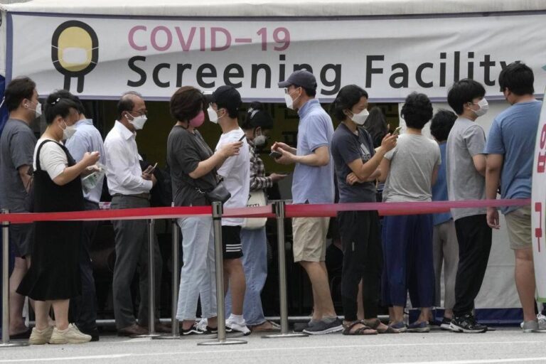 Lockdowns in Asia as some nations see first major virus surge