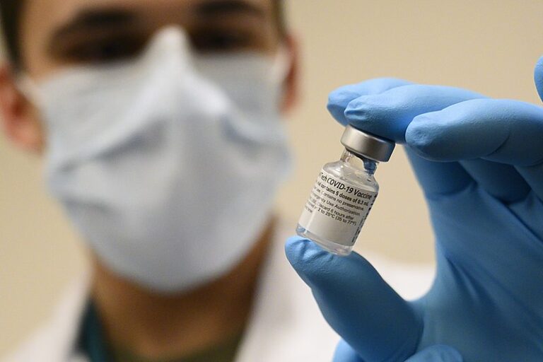 Attacking anti-vaccine movement, Biden mandates widespread COVID shots, tests