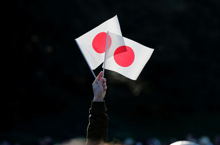 Japan says suspected Chinese submarine seen near territorial waters