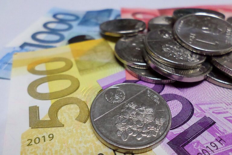 Easy policy lays out a hard road for underperforming peso, baht