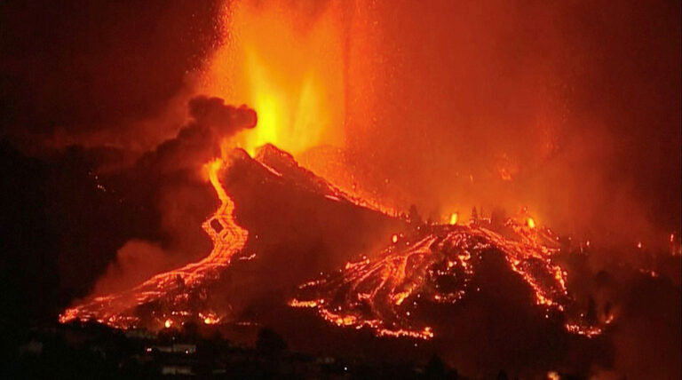 Lava pours out of volcano on La Palma in Canary Islands