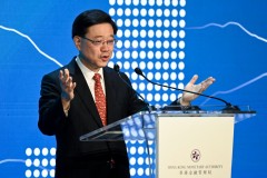 ‘Law and order returned’ Hong Kong’s US-sanctioned leader says at banking summit